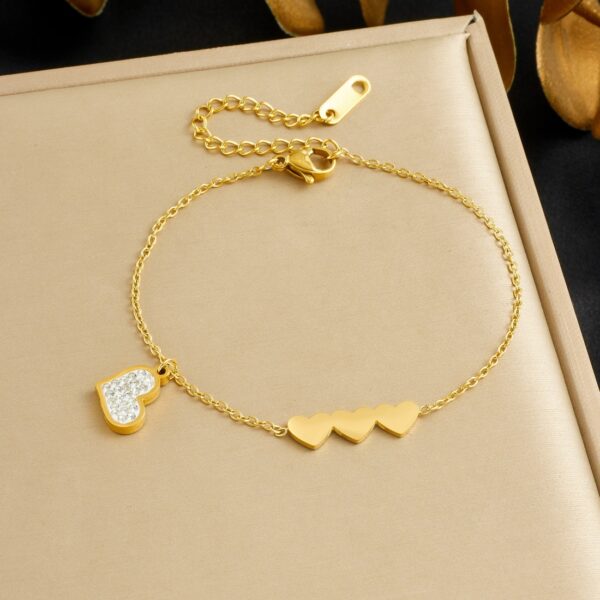 Wholesale Gold-plated Stainless Steel with Three Heart Charms and Rhinestones Bracelet