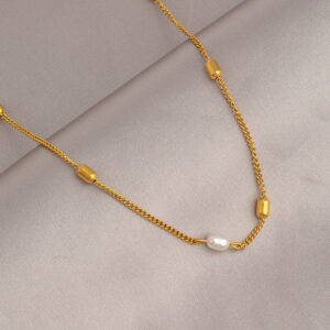 Golden beanie pearl necklace