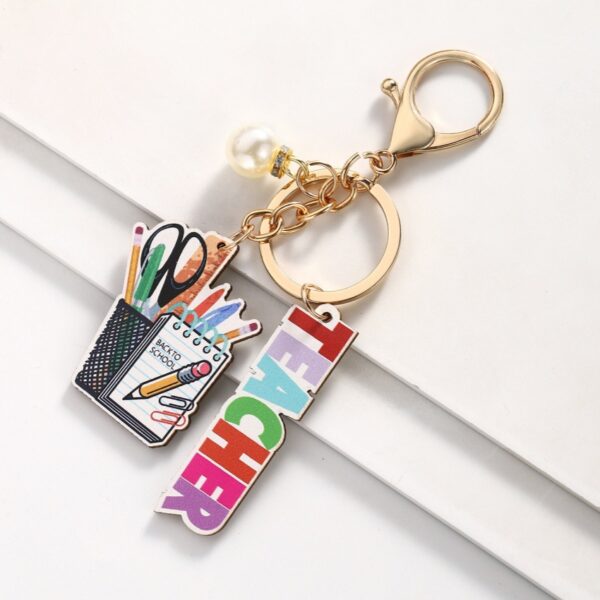 Wholesale Campus style graduation season wooden book keychain