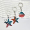 O1CN01hpnOEN1TDR1GAgumb_2219145822348-0-cib Wholesale Colorful Ocean Star Shell Metal Keychain