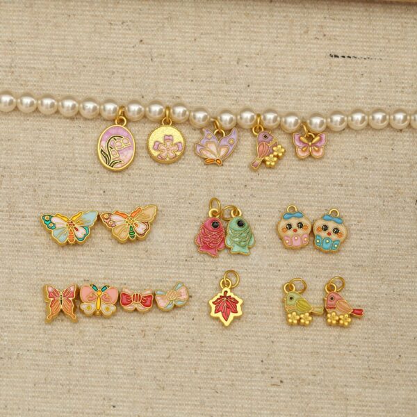 Wholesale diy lily of the valley flower pendant butterfly beaded cartoon alloy bracelet necklace clothing aessories jewelry fresh magpie