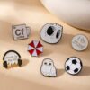 Wholesale Cartoon football brooch dripping oil accessories