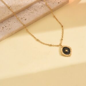 Black and gold pendant necklace