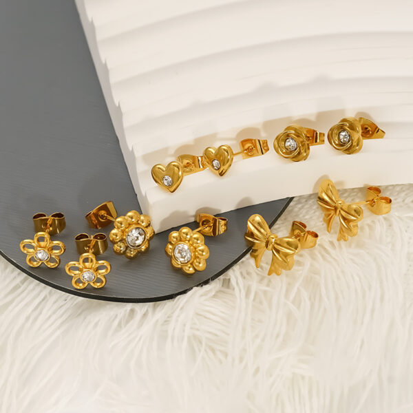 O1CN01iKEher2NGHxsaTiVP_2217889189935-0-cib Wholesale Stainless Steel Heart Flower Hollow Zircon Bow Earrings