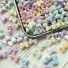 O1CN01iMEeRV2N5kr03GcS3_2216430329912-0-cib Wholesale Four-way bow Acrylic Beads