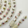 O1CN01isJk2L1HgUn6DO99r_2216860830787-0-cib Wholesale Acrylic printed cartoon witch hunter gro straight hole round beads DIY TikTok live streaming beaded mobile phone rope jewelry aessories