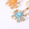 Wholesale Cute pearl inlaid octopus inlaid rhinestone Metal Keychain