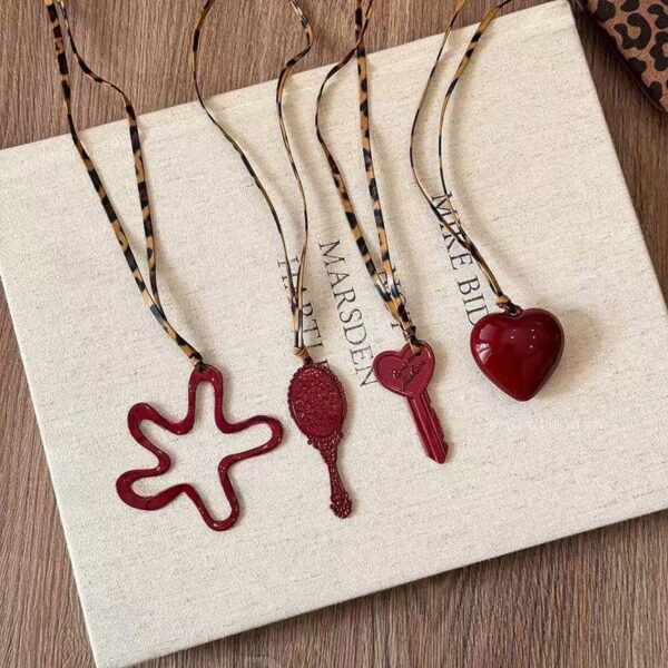 Wholesale Red hollow flower heart-shaped necklace