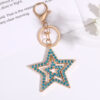 Wholesale Five pointed star hollow diamond inlaid metal keychain