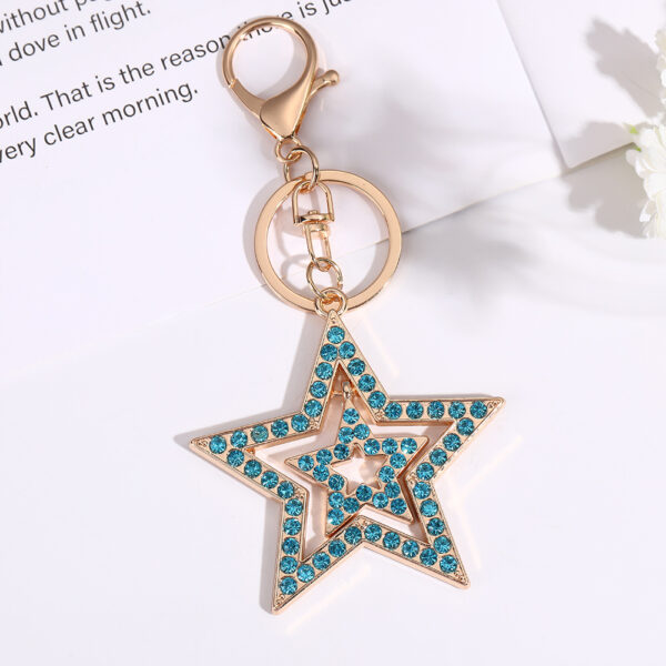 Wholesale Five pointed star hollow diamond inlaid metal keychain