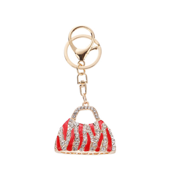 O1CN01j5ufKe27Kq2s1kjFw_2218648477779-0-cib Wholesale Rhinestone Leopard Print Creative Bag Car Keychain