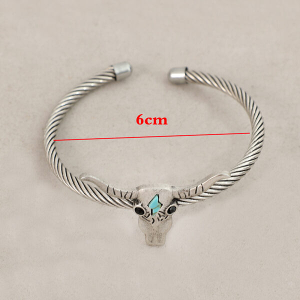 O1CN01jItwlf1qyMgA1h0CI_2206372095564-0-cib Wholesale Western style cow head inlaid with turquoise opening bracelet