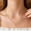 Wholesale Golden creative bow pendant stainless steel necklace
