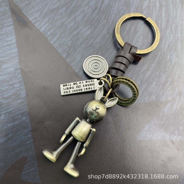 O1CN01jZXMNf1FKOLn9xaNb_2218365010468-0-cib Wholesale Vintage hand-woven movable rabbit cowhide keychain