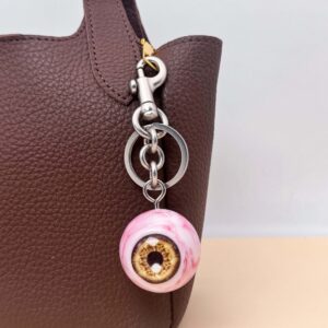 Yellow eyes (keychain titanium silver)