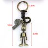 O1CN01k8nkgF1FKOLuTpuXH_2218365010468-0-cib Wholesale Vintage hand-woven movable rabbit cowhide keychain