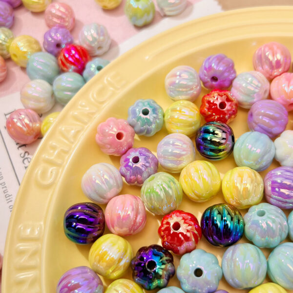 O1CN01kXrYD52N5khAwsZRn_2216430329912-0-cib Wholesale 14mm Asymmetrical Resin Pumpkin Beads