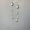O1CN01kapIXu26dmlOeWE2F_2209765657685-0-cib Wholesale Alloy Silver Teardrop Tassel Earrings