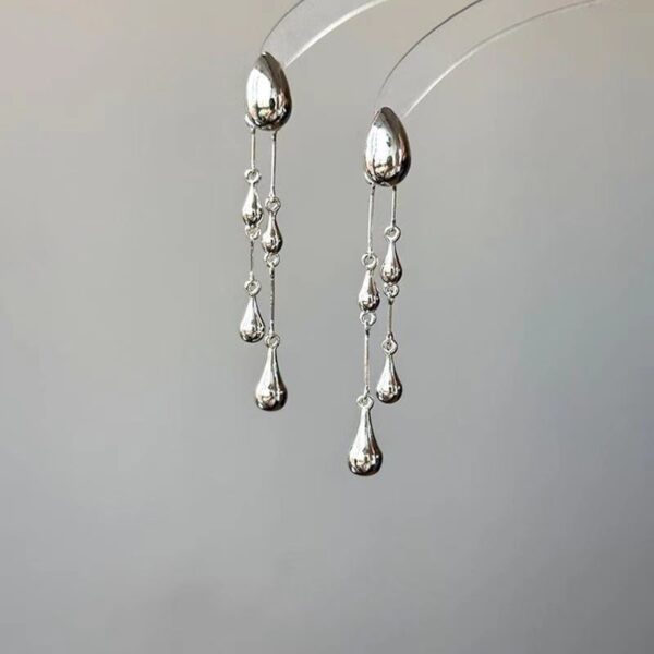 O1CN01kapIXu26dmlOeWE2F_2209765657685-0-cib Wholesale Alloy Silver Teardrop Tassel Earrings
