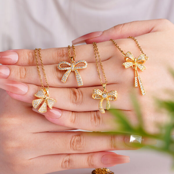 O1CN01kqvzpC20t0JmjxD1p_2215152786906-0-cib Wholesale Copper Inlaid Zircon Bow Pendant Luxury Versatile Stainless Steel Clavicle Necklace Jewelry