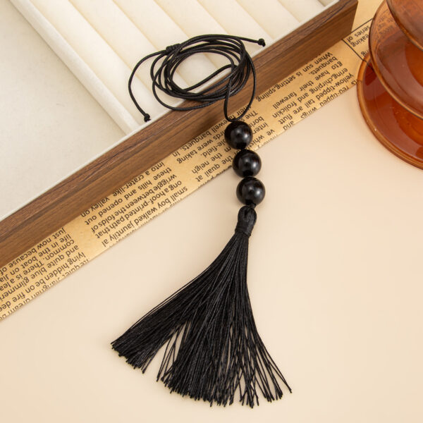 O1CN01lAVvQD23kFcJhyrI3_2588757293-0-cib Wholesale Black acrylic tassel long necklace