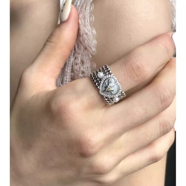 O1CN01lMcBop1m65OryLTyw_2209494864904-0-cib Wholesale Love wide pearl hexagonal star adjustable ring with an opening