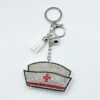 Wholesale Diamond-studded nurse cap keychain fashionable tassel metal pendant