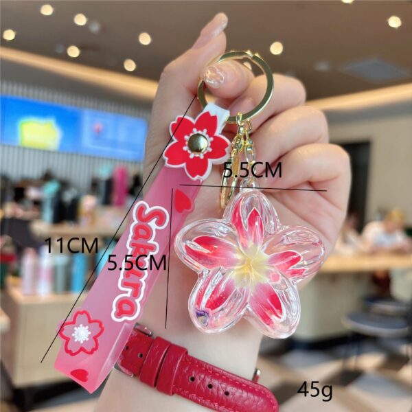 O1CN01lqgPeg1k48SQajFHh_2211846614629-0-cib Wholesale Acrylic Liquid Sand Plumeria Keychain
