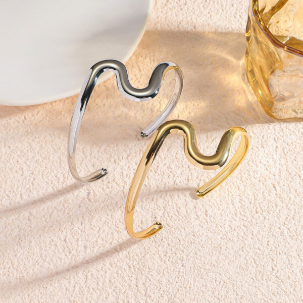 Wholesale European and American cross-border wholesale geometric wave open bracelet alloy smooth surface unique style niche irregular fashion armband