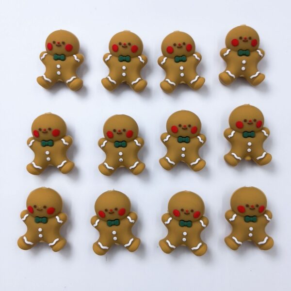 O1CN01mCbQ7G2FO3gUWr2RD_2216349148869-0-cib Wholesale 10pcs 3D Gingerbread Villain's New Three-dimensional Silicone Cartoon DYI Beads