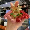 O1CN01mR3sFo1wdCDU5nr3J_2218646186330-0-cib Wholesale Clay Full Rhinestone Heart Cherry Lanyard Keychain
