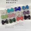 Wholesale Colorful bow-shaped clay beads with full-hole illing