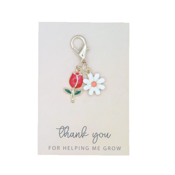 O1CN01mvE7ku1IC66BoM3xu_2219385860856-0-cib Wholesale Colorful Tulip Sunflower Alloy Keychain