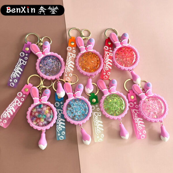 O1CN01myUgze1TybokKkosm_2208062092451-0-cib Wholesale Acrylic Liquid Sand Bunny Ear Keychain
