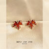 O1CN01mzbt6B1UIkynw1BQ5_2597552495-0-cib Wholesale Micro inlaid zircon red maple leaf silver needle earrings