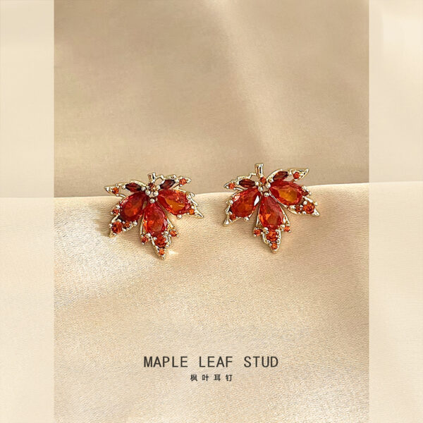 O1CN01mzbt6B1UIkynw1BQ5_2597552495-0-cib Wholesale Micro inlaid zircon red maple leaf silver needle earrings