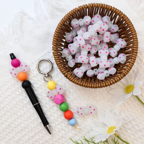 O1CN01mzyouP2FO3h9T1rTC_2216349148869-0-cib Wholesale 10pcs 3D Black Dot Red Dot Bow New Three-dimensional Silicone Cute Cartoon DYI Beads