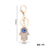 Wholesale Palm Devil's Eye with Water Diamond Metal Keychain