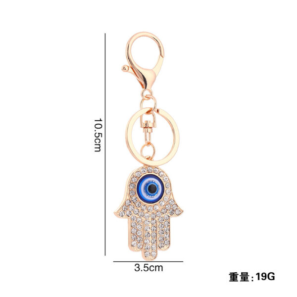 Wholesale Palm Devil's Eye with Water Diamond Metal Keychain