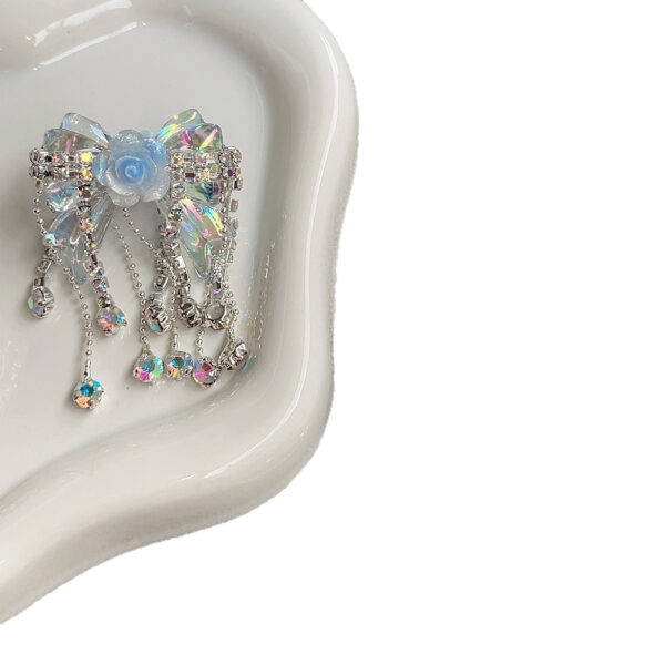 O1CN01nKfn4t1j8QZncCXy1_6000000004503-0-cib Wholesale Tassel Bow Knot Rhinestone Straight Hole Beads