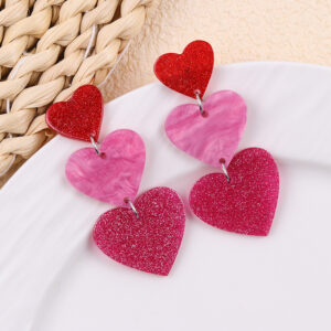Three large purple-pink hearts