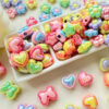 O1CN01oBhzEp2N5kl1TPCLK_2216430329912-0-cib Wholesale Color matching five-inted star flower love resin beads