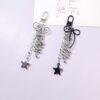 Wholesale Bow five pointed star tassel metal keychain