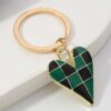 Wholesale Amazon checkered alloy heart personalized devil's eye keychain