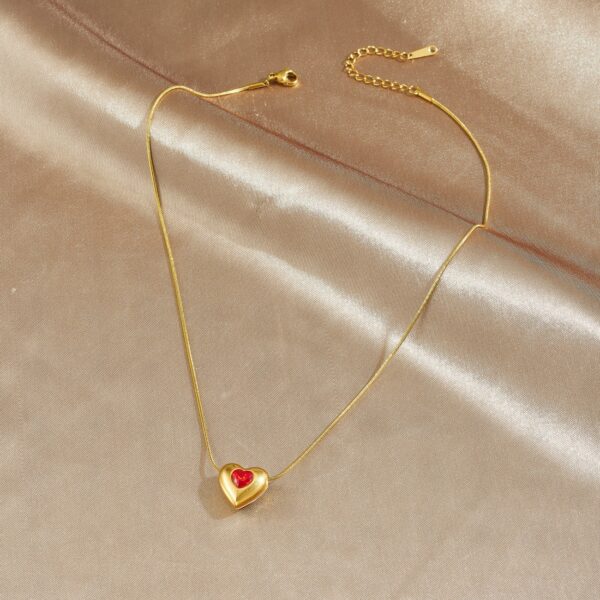 O1CN01oYMJo52Iz6hs3BqFx_2213317019356-0-cib Wholesale Diamond-encrusted heart-shaped stainless steel necklace