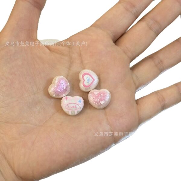 O1CN01omEtyq1xmBbc8dloQ_2221442006485-0-cib Wholesale 10pcs pink printed heart-shaped relief string acrylic beads