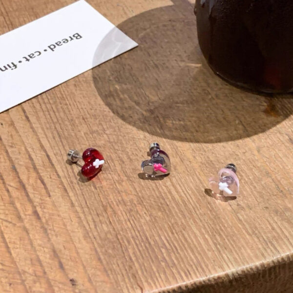 Wholesale Dark cross anti-allergic heart stud earrings