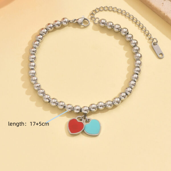 O1CN01p5CU801MqBCdnosur_2212889381485-0-cib Wholesale Stainless Steel Powder Blue Double Heart Bracelet