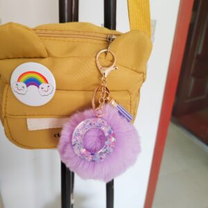 Purple letter fur ball pendant/O