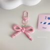 Wholesale spring and summer candy-colored hollow butterfly bow keychain